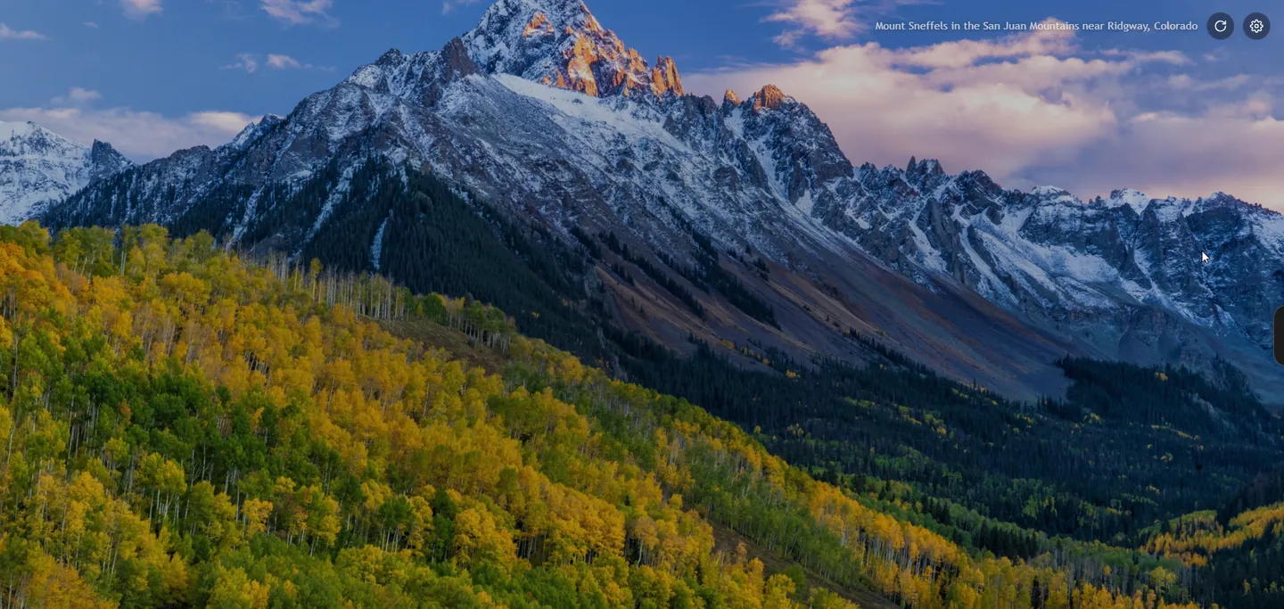 Homebase Hub's start page with a mountain photo and its credit in the corner